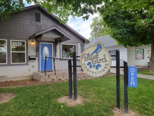 On 1-way street in older Caldwell near'ish downtown with parking in back and easy access up a walkway and ramp to front door