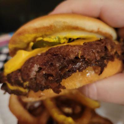 Classic double. They call them "steak" burgers, but if you're familiar with true SMASH burgers with crispy ends THIS is it. Yum!