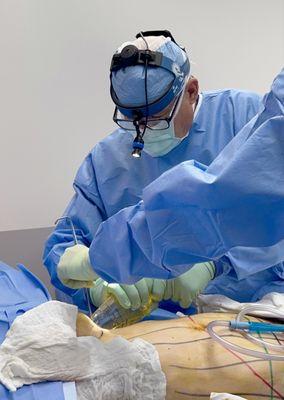 Dr. Eberbach performing surgery on a patient