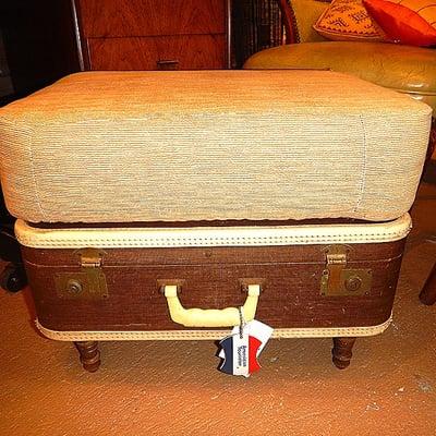 Vintage trunk ottoman, complete with American Tourister luggage tag! Perfect for any traveler's living room!