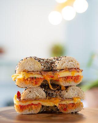 Bacon, Egg, Tomato Spread, and Cheddar on a delicious Dopest Dough bagel!  Skip the bacon to make it vegetarian!