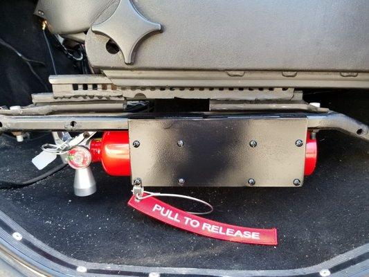 Fire extinguisher mounted under drivers seat with the help of Thousand Oaks Welding.