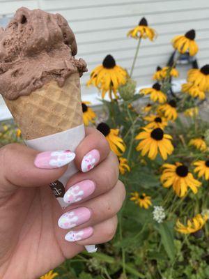 Dairy free chocolate ice cream in a sugar cone