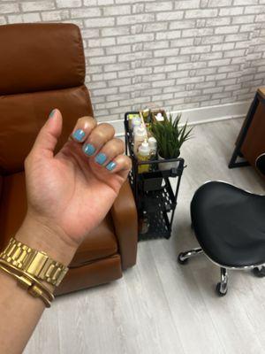 Dazzle dry mani with salon decor in back