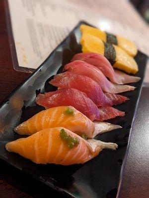 Tamago, yellowtail, tuna, and salmon belly nigiri