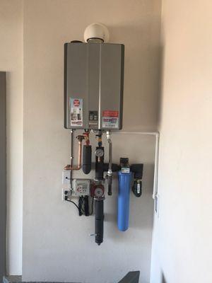 Super clean tankless install in a new home.  Installed with pride!