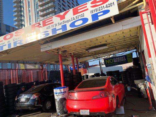 My red g35 getting tires patched & put on x2