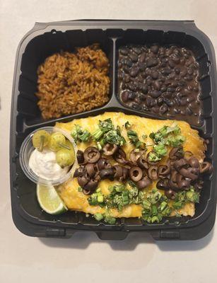 Spanish Rice - Black Beans - Red Sauce Enchiladas made with Mushroom & Tempeh garnished with onion & cilantro and black mild olive.