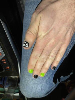 Crappy dip mani with nail art. Should have painted the 64 on myself I would have done a better job. Won't be coming back