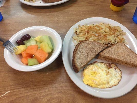 Wheat toast, egg, hash browns from the grill. Fruit cup on the side extra.