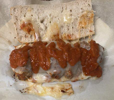 Half meatball sub. Fantastic! Ciabatta, flavorful provolone & Parmesan cheeses, ample, juicy meatballs & marinara sauce on the side.