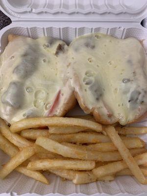 Philly Steak and Cheese Grinder, with fries