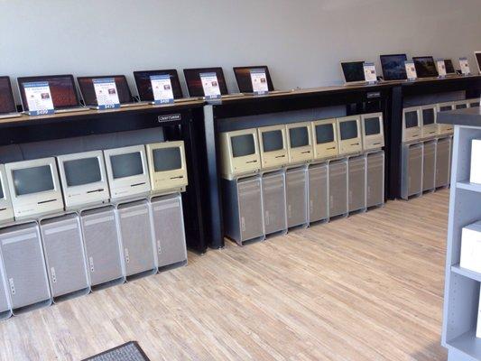 A row of 1980's Macintosh SEs greet you upon entry.