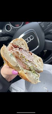 Smoked turkey and herb cream cheese sandwich with bacon