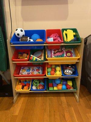 Our wonderful toy bin, filled with tons of toys and activities. We like to switch out the toys often, to keep children interested & engaged.