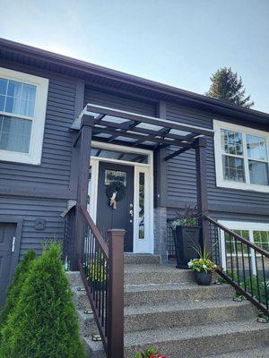 Primed and painted exterior job on a home.