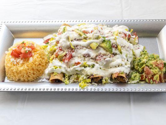 Flautas with a side of rice and guacamole