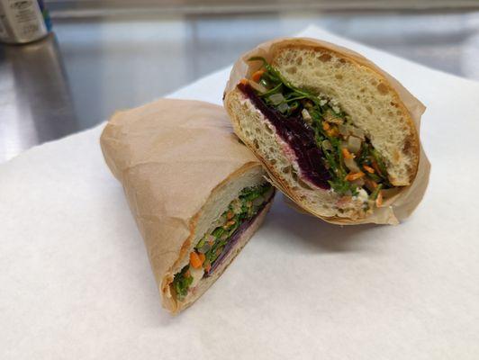 Roasted Beet.  Tarragon roasted beets, blue cheese spread and arugula slaw on crusty baguette.