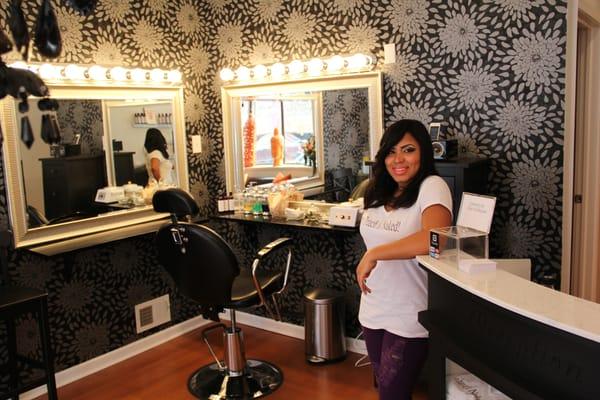 Front desk girl Alita at the brow and makeup station.