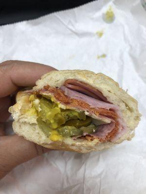 Italian B.M.T. with pepper jack cheese, pickles, jalapeños, pepperoncinis, and mustard - Delicious