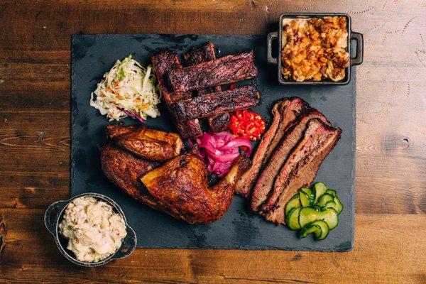 Sliced brisket, ribs & half chicken