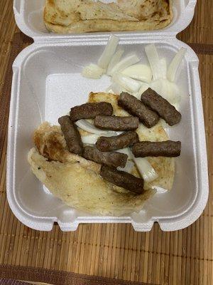 Cevapi, onions, pita & cream cheese (odd combo) but very good