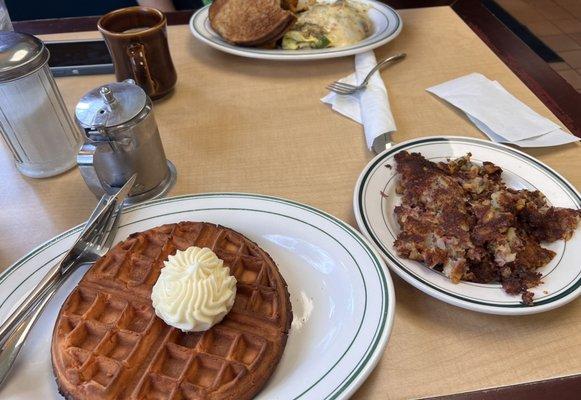 Orange creamsicle waffle, corned beef hash, toast, custom omelette, coffee