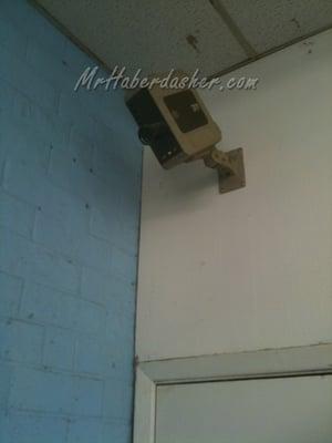 The 1960s vintage security camera that looks over the change machines.  It may work, it may not -- it's a secret.