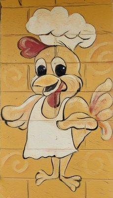 Don't know what this chicken is so happy about.  Best to not tell him.