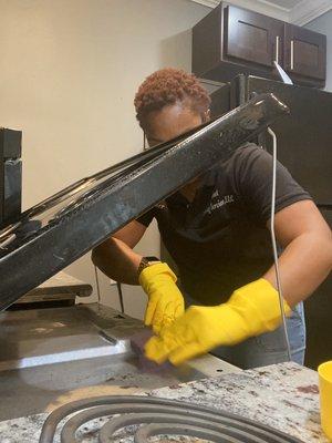 Here's the Owner RoShawn cleaning a client's AirBnB.