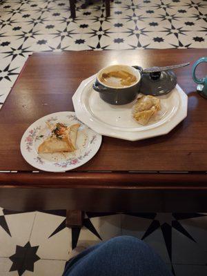 Curry chicken soup, curry empanada and a street corn empanadas and a chocolate bomb  Delicious