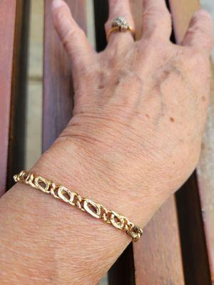 14K gold bracelet repaired.