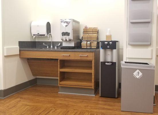 Coffee, hot chocolate, tea bar inside the infusion center waiting area.