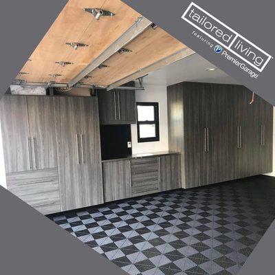 PremierTrax floor paired with our Alno cabinets adds so much character to any garage!