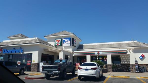 Not often that you see 7 Eleven attached to a Dominos with tables & a Post office