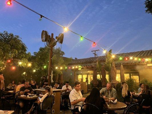 The delightful patio at twilight.