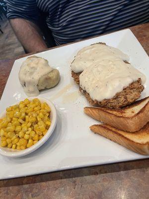 Chicken fried steak, mash potatoes, & corn.