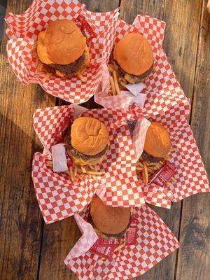 A double burger with fries