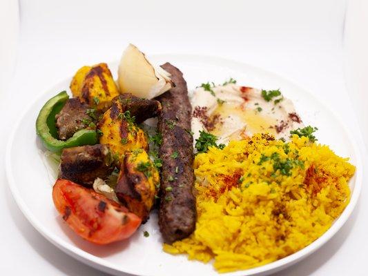 Meat Combination Plate,
Three skewers of shish kabab, kifta kabab, and shish Taouk. Served with hummus or rice or half and half