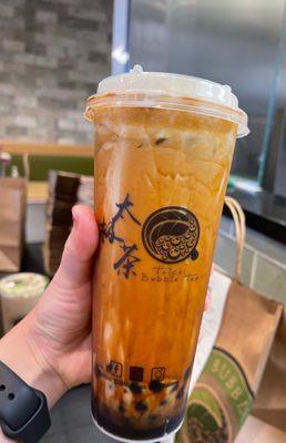 Brown sugar milk tea with milk cap