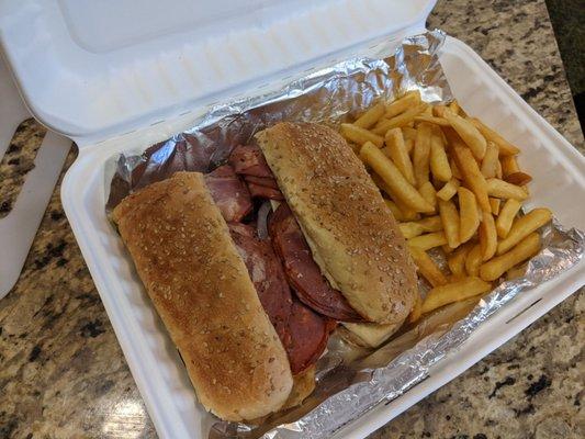 Capicol on seeded bun with French fries