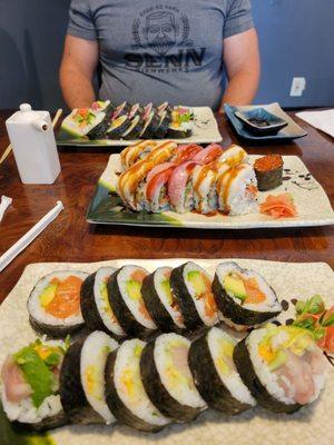 Front: Spicy yellowtail roll, salmon avocado roll; Middle: kamikaze roll; Back: spicy salmon roll, tuna avocado roll