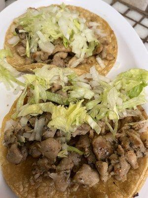 Chicken tacos w/ onions and lettuce