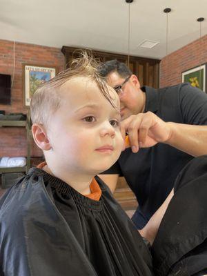 Jonathan cutting my 2 yr olds hair!