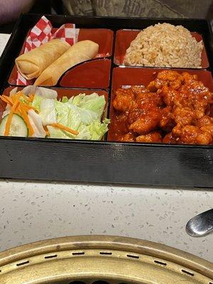 Spicy chicken bento lunch special. "Salad" had no dressing it was lettuce and carrots. He like the chicken.