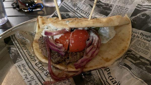 Lamb gyro burger on flatbread