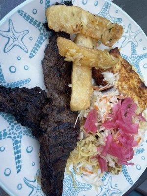 Steak, yuca, cabbage salad, cheese