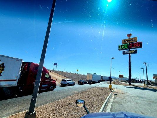 Line for the diesel fuel pumps goes all the way back and around the corner and blocks highway access.