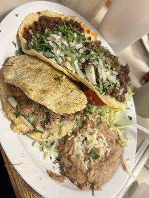 combination plate #1 with a gordita & 2 tacos with rice and beans