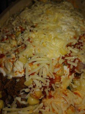 Burrito bowl with barbacoa and corn salsa